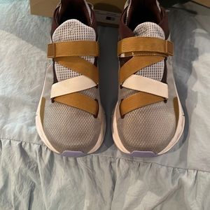 On cloud shoes. Never worn